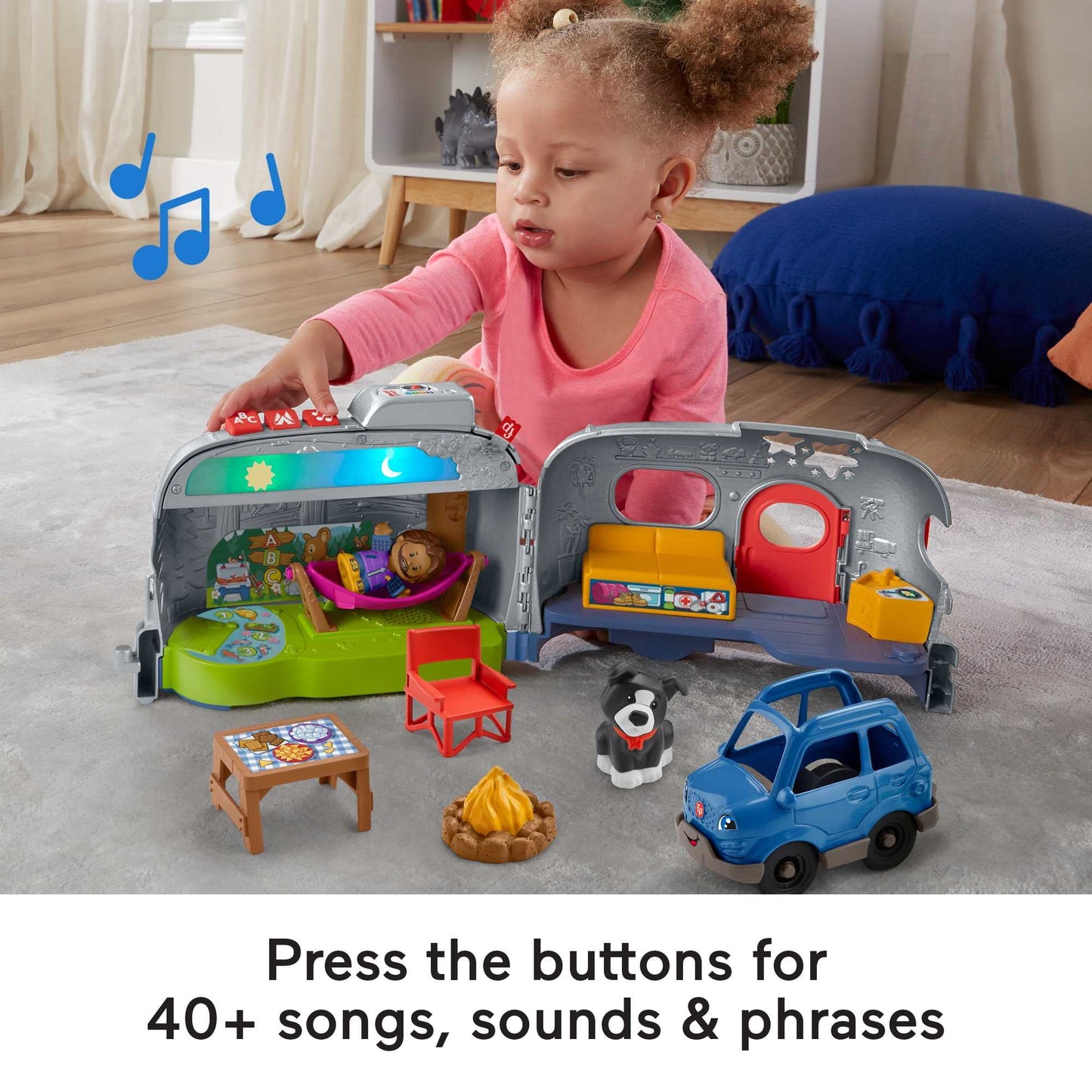 Fisher-Price Little People Light-Up Learning Camper playset with vehicle, colorful figures, lights, and buttons for ages 1 and up.