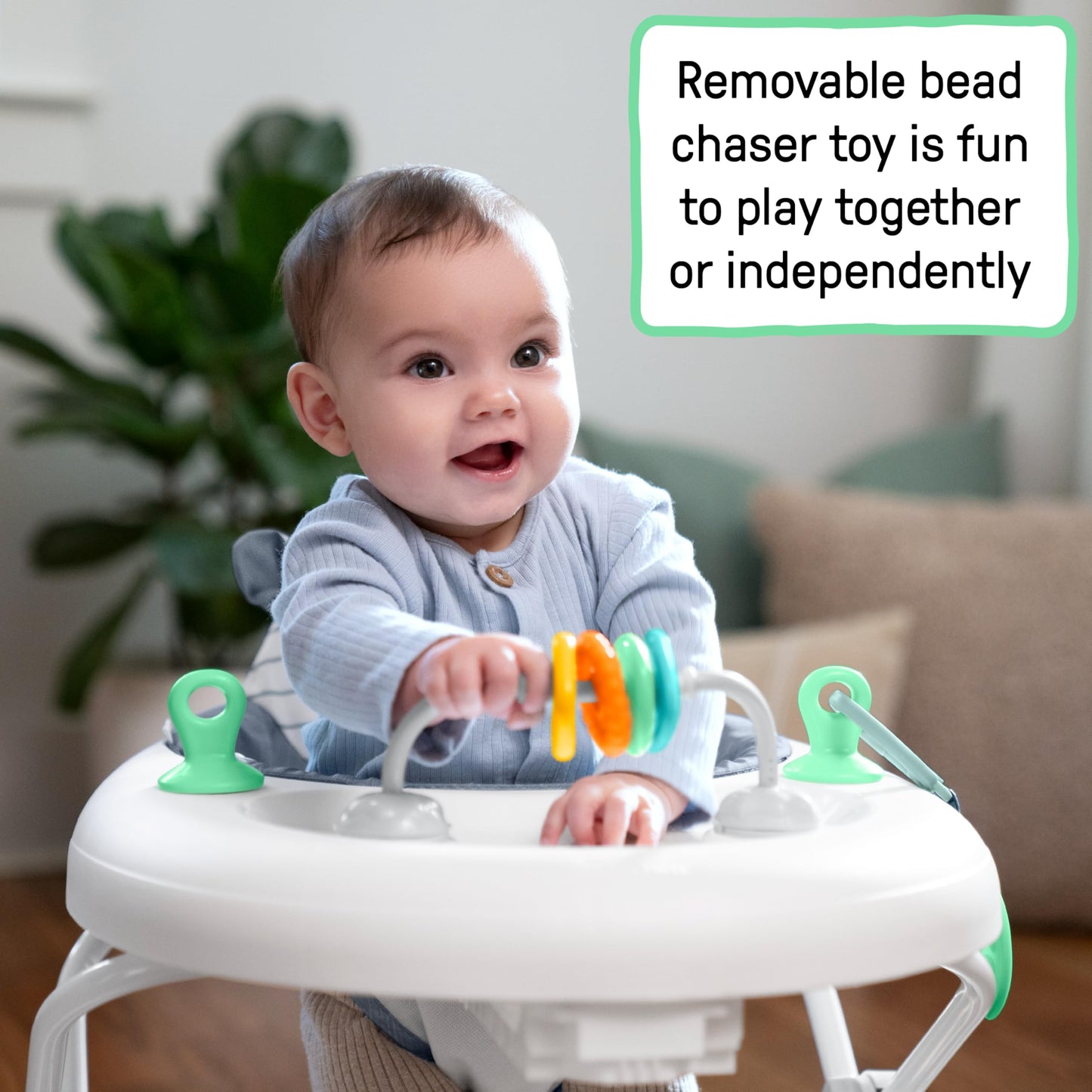 Ingenuity Smooth Strides Activity Walker in chambray with toys, 3-position height adjustment for babies 6-12 months.