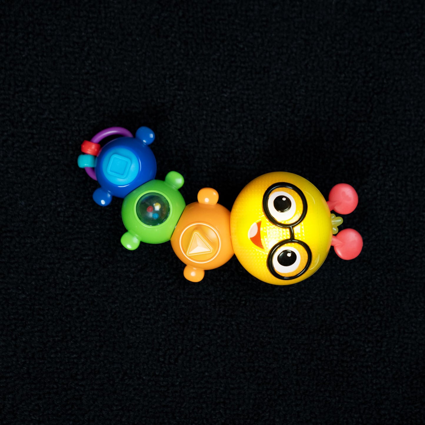 Baby Einstein Twist-a-Pal Cal sensory toy with colorful beads, music features, perfect for babies 6 months and up.