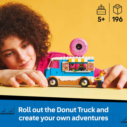 LEGO City Donut Truck toy featuring a mobile food stand, two minifigures, and colorful accessories for creative play.