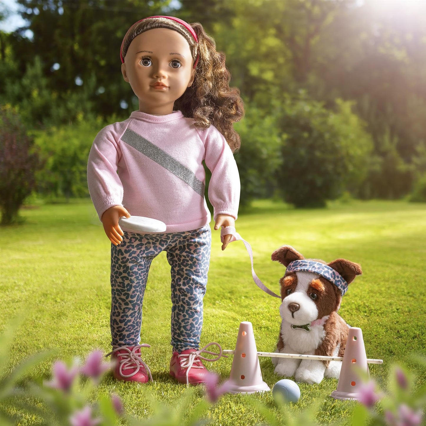 18-inch Our Generation Natalia doll with Nillie pet in agility training set, featuring accessories for kids' pretend play.