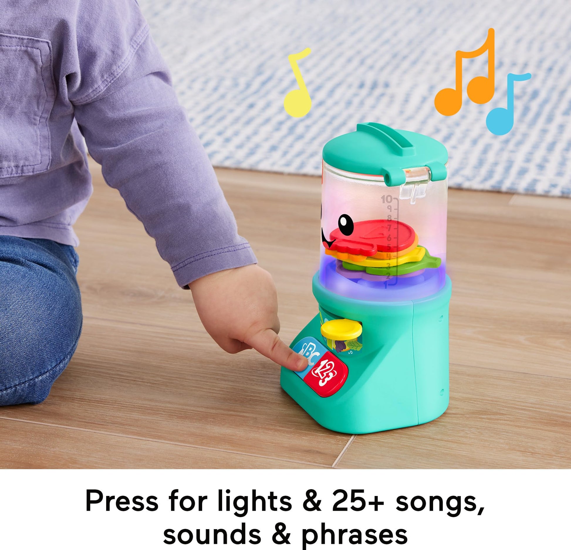 Fisher-Price Laugh & Learn baby & toddler pretend blender toy with colorful buttons, lights, and music for ages 9 months and up.