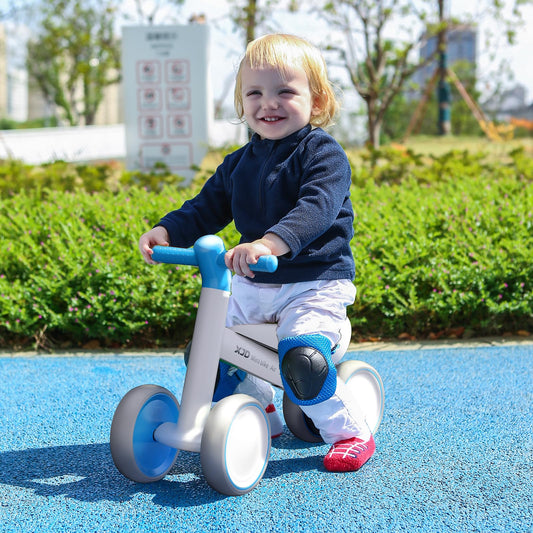 Cyan XJD baby balance bike for toddlers aged 10-24 months, featuring a no-pedal design and sturdy frame for riding fun.