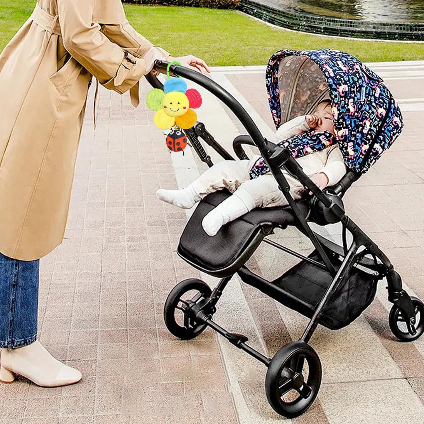 Jingyash baby pram toy with hanging plush rattle, music, and handbells for stroller, promoting early development and sensory play.