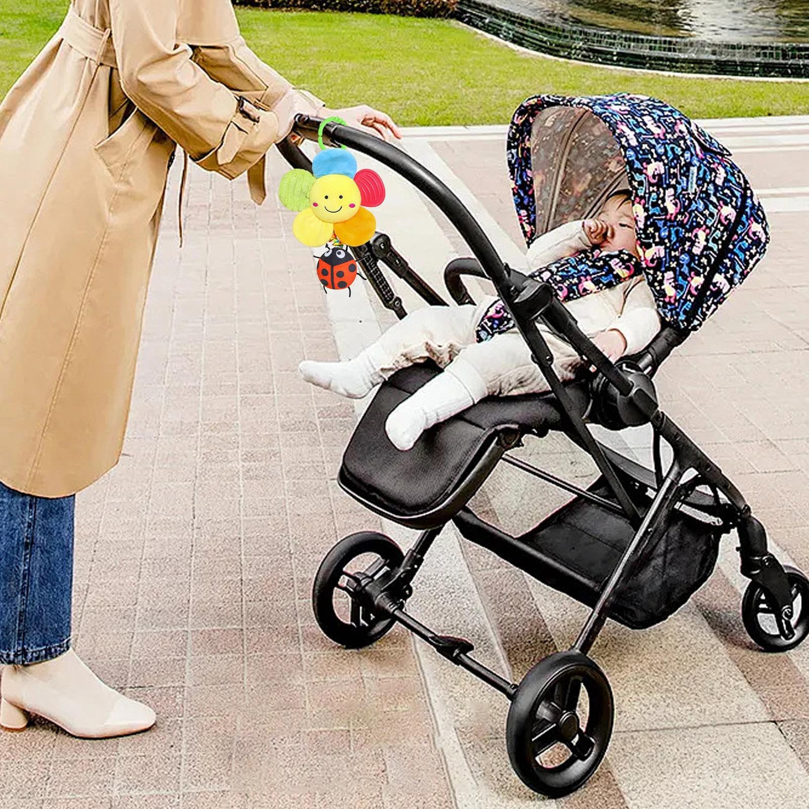 Jingyash baby pram toy with hanging plush rattle, music, and handbells for stroller, promoting early development and sensory play.