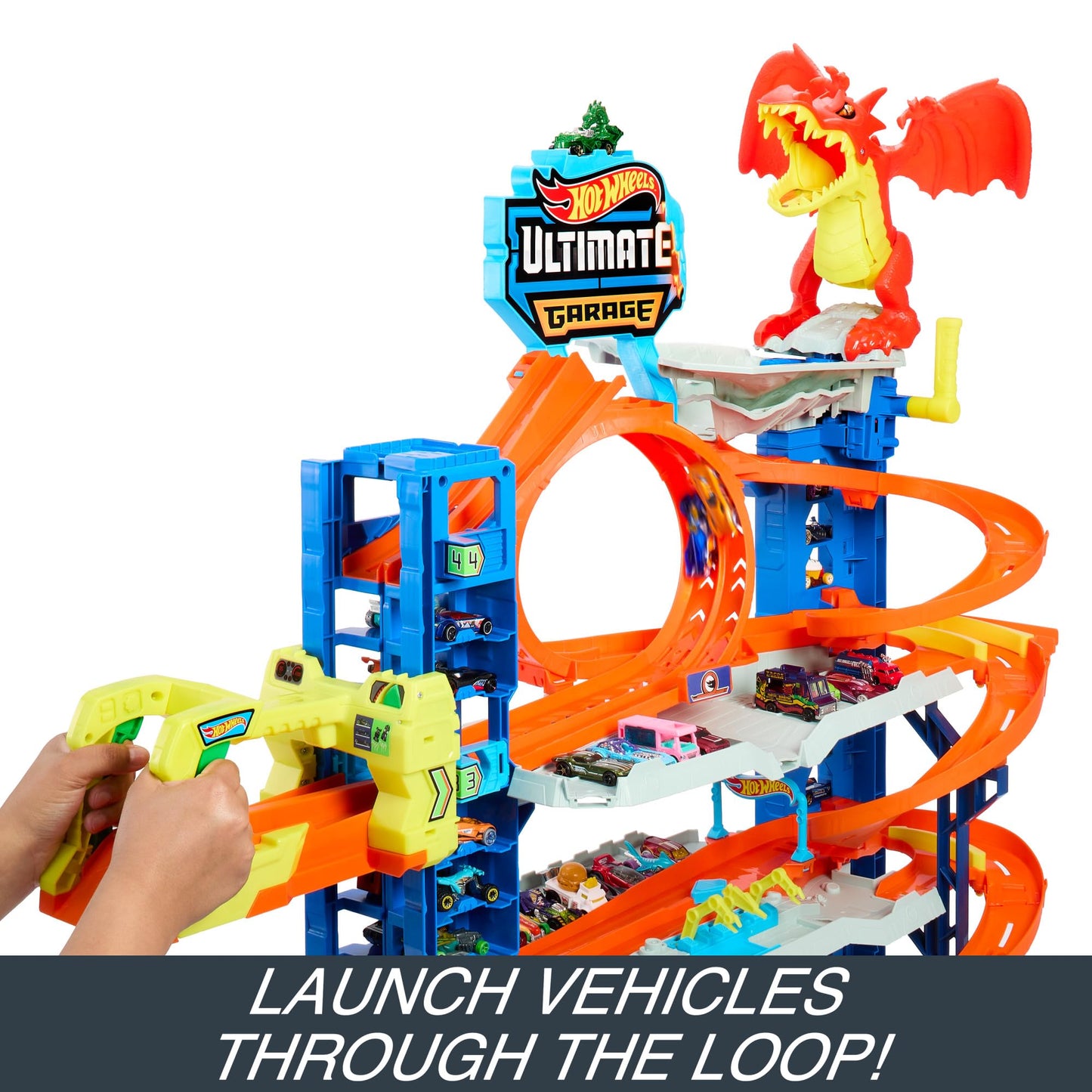 Hot Wheels City Ultimate Garage Playset with 2 die-cast cars, 4 levels of track, and dragon feature for exciting play.