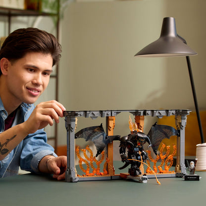 LEGO Icons Balrog Book Nook featuring Gandalf the Grey minifigure and dragon figure, ideal for bookshelf decor.