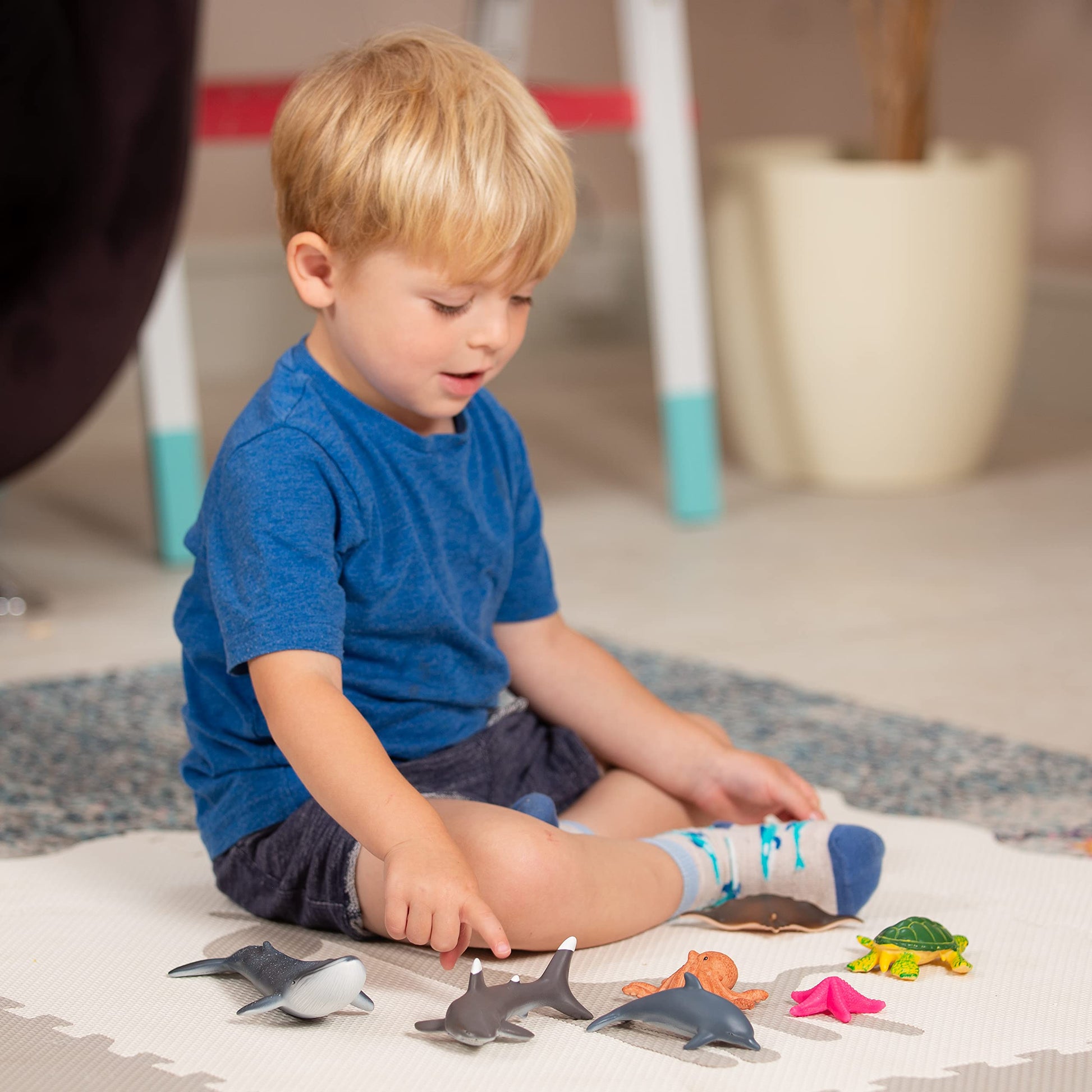 Set of 7 Learning Minds jumbo sea animal figures including shark, whale, and dolphin toys for children aged 18 months and up.