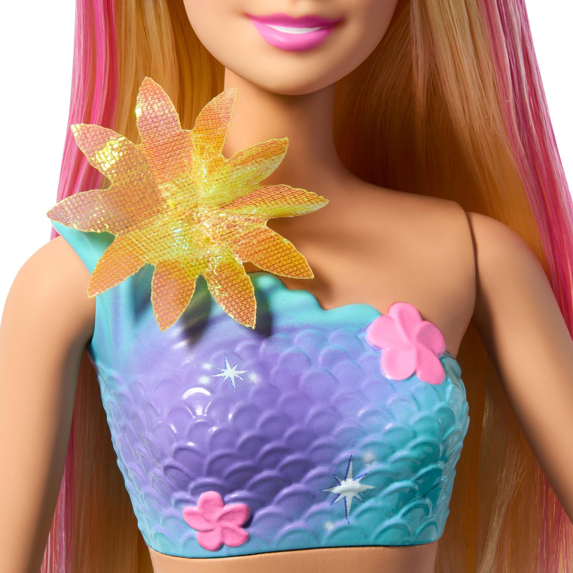 Barbie Mermaid toy doll with long blonde hair, pink highlights, pearl headband, ombre tail, and surprise blooming flowers feature.