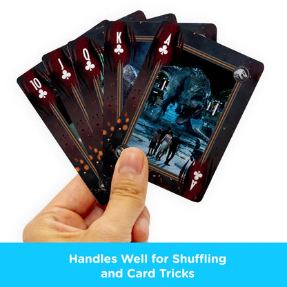 AQUARIUS Jurassic World playing cards featuring dinosaur images and Jurassic World branding on the card backs.
