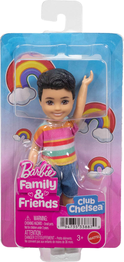 Barbie Club Chelsea Koji 6-inch boy doll with brunette hair, striped shirt, shorts, and shoes, standing against a white background.