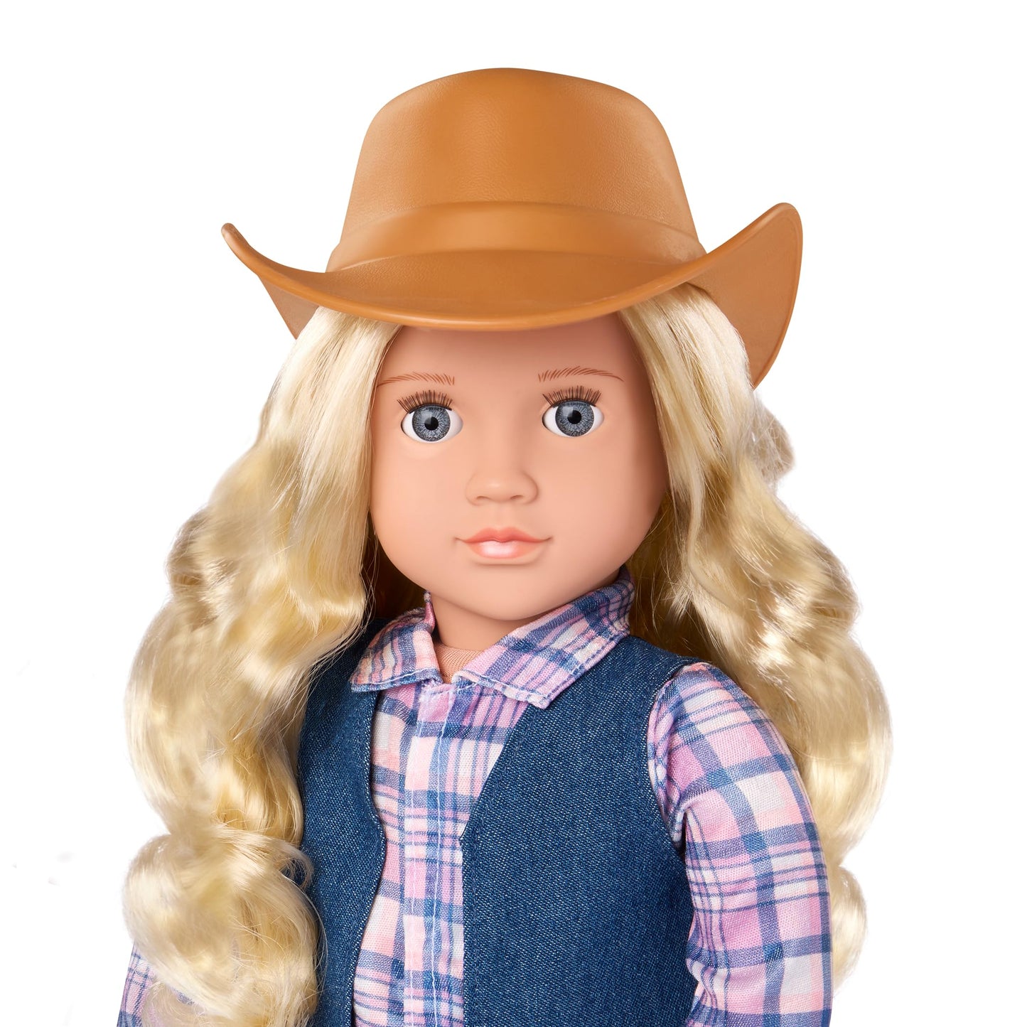 Our Generation Ashleigh Cowgirl Doll wearing a cowboy hat and tall riding boots, with lifelike gray eyes and western outfit.