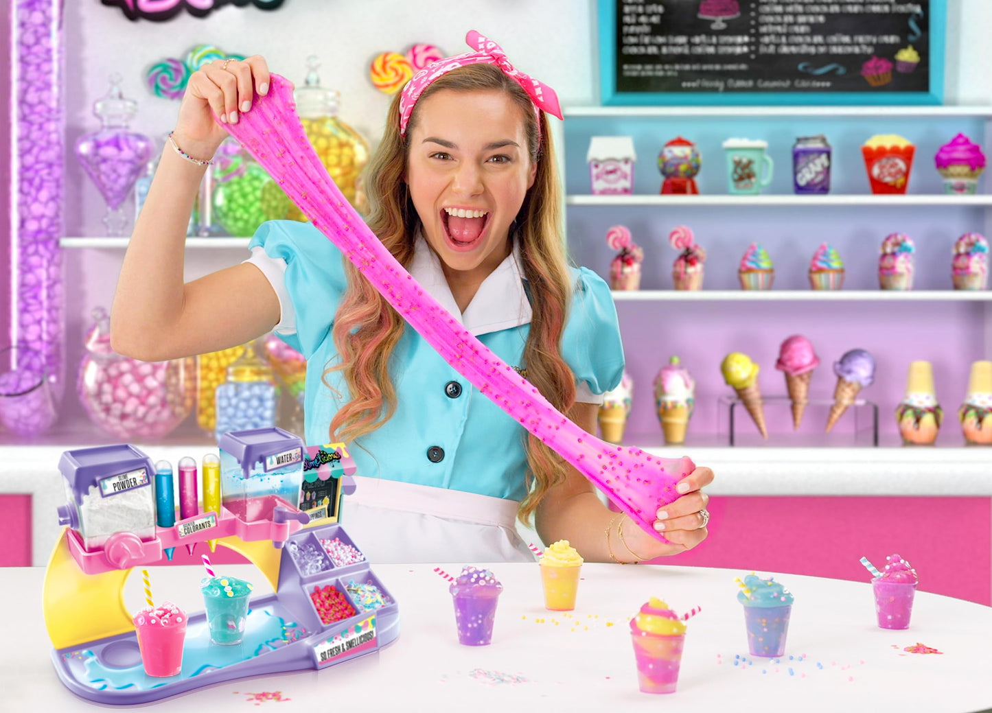 Canal Toys So Slime DIY Slimelicious Slime Station with colorful slime, decorations, shakers, and mixing tools for making scented slimes.