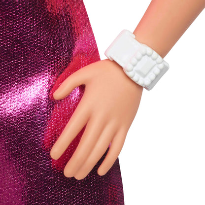 Barbie Fashionistas Doll #230 in metallic pink minidress with heart cut-out, featuring blond hair, white bracelet, and heels.