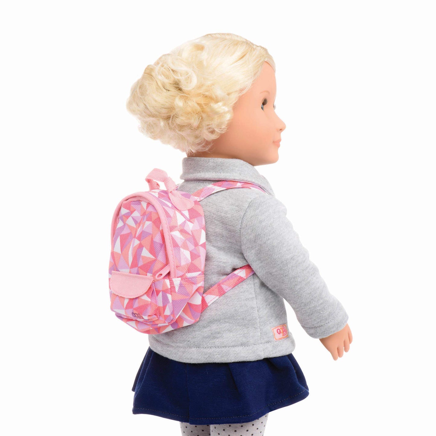 Our Generation Off To School doll accessories set with backpack, books, notebook, and school supplies for children aged 3 and up.