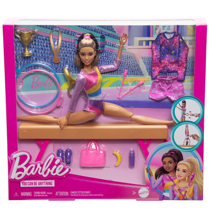 Barbie gymnastics doll playset with brunette doll, balance beam, warm-up suit, accessories, and flipping action C-clip.