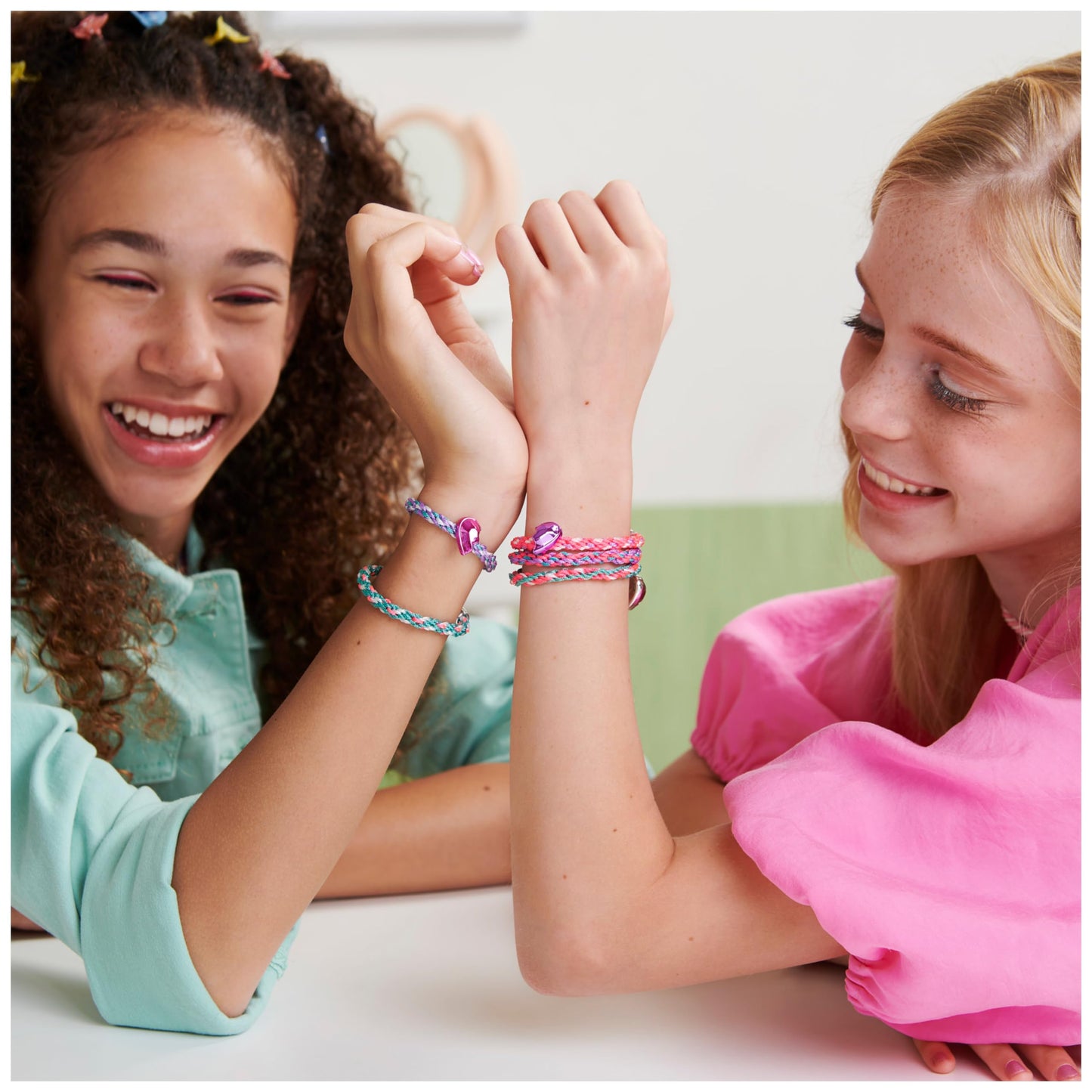 Cool MAKER KumiKreator bead and braider kit for kids, showing colorful beads, strings, and tools for making friendship necklaces and bracelets.