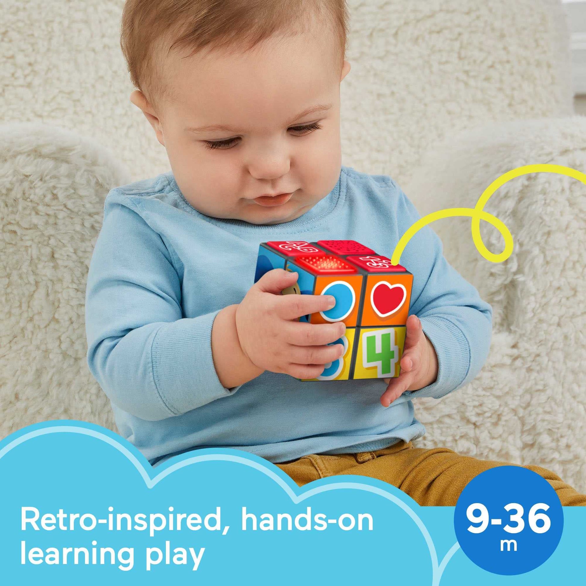Fisher-Price Laugh & Learn Puppy activity cube with lights, music, and colorful buttons for babies 9+ months.