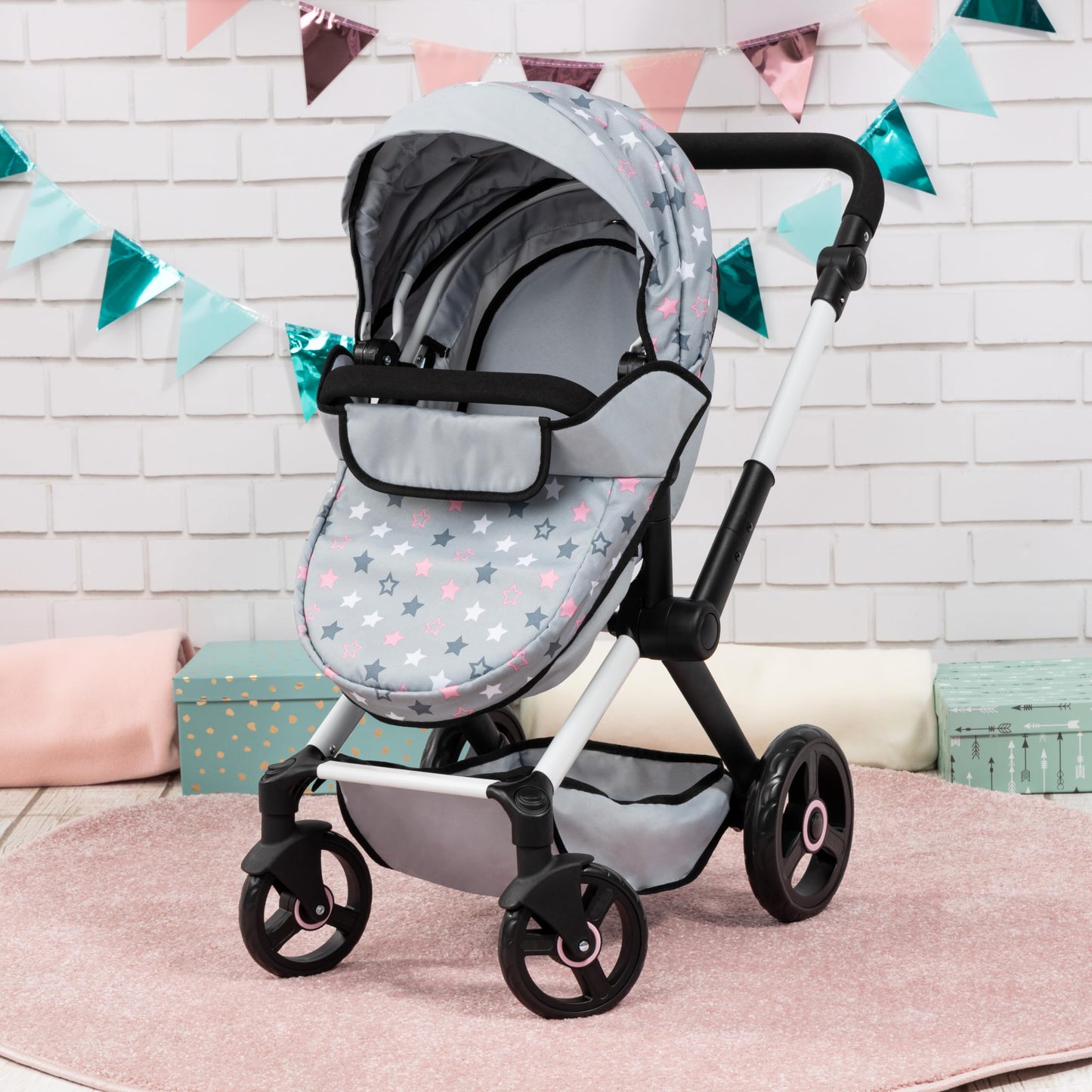 Bayer Baby Dolls Pram XEO in light grey with pink stars, convertible doll stroller with carrycot, changing bag, and adjustable handle.