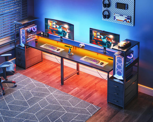 Coleshome gaming desk with LED lights, power outlet, drawers, monitor stand, and carbon fiber black finish.