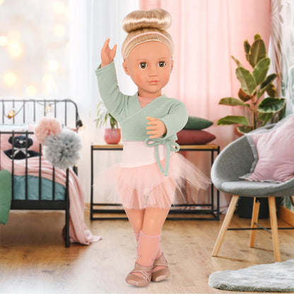 Our Generation Viola Ballerina Doll in a pink tutu with dance clothing, featuring a soft body for realistic play.