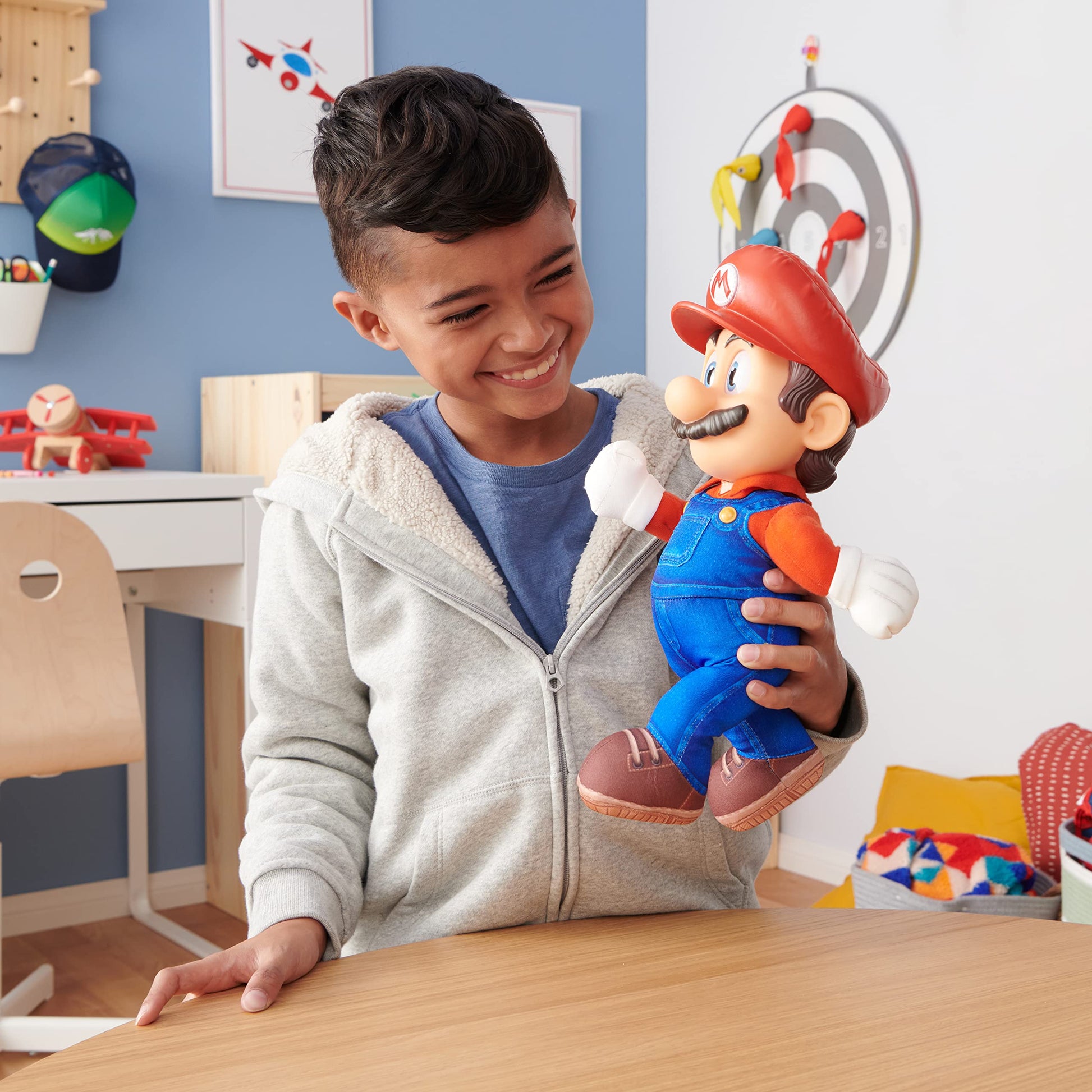 Nintendo Super Mario Bros. Movie poseable plush toy, 14-inch tall with realistic eyes and fully articulated limbs.