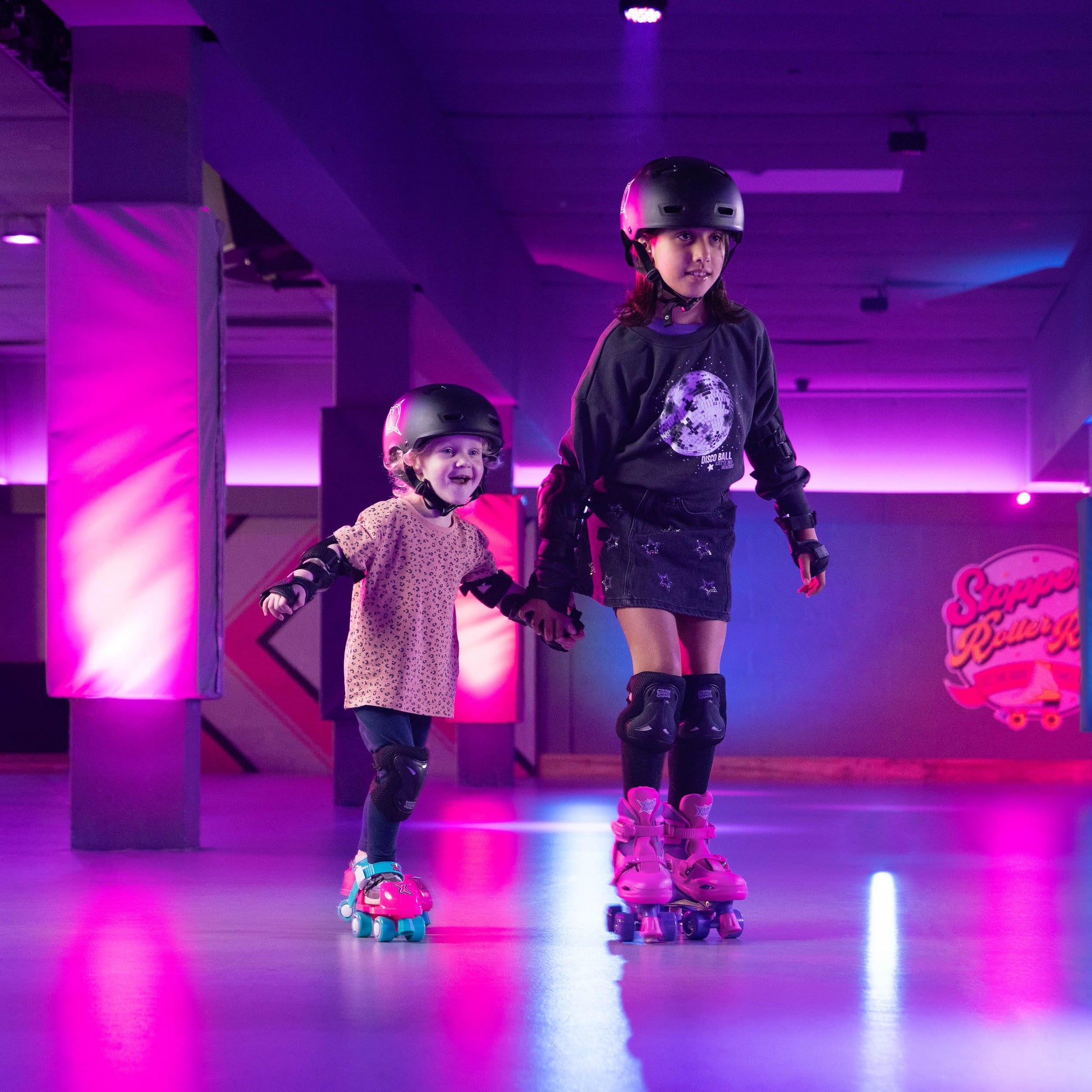 Xootz kids adjustable quad roller skates for boys and girls, showing colorful skates with ankle support for indoor and outdoor skating.