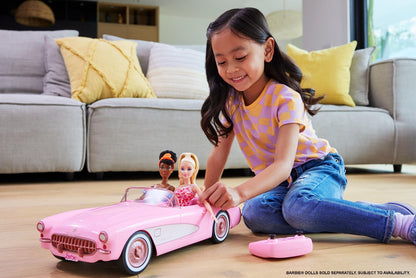 Barbie Hot Wheels remote control Corvette car, battery-operated, holds 2 dolls, with an opening trunk for storage.