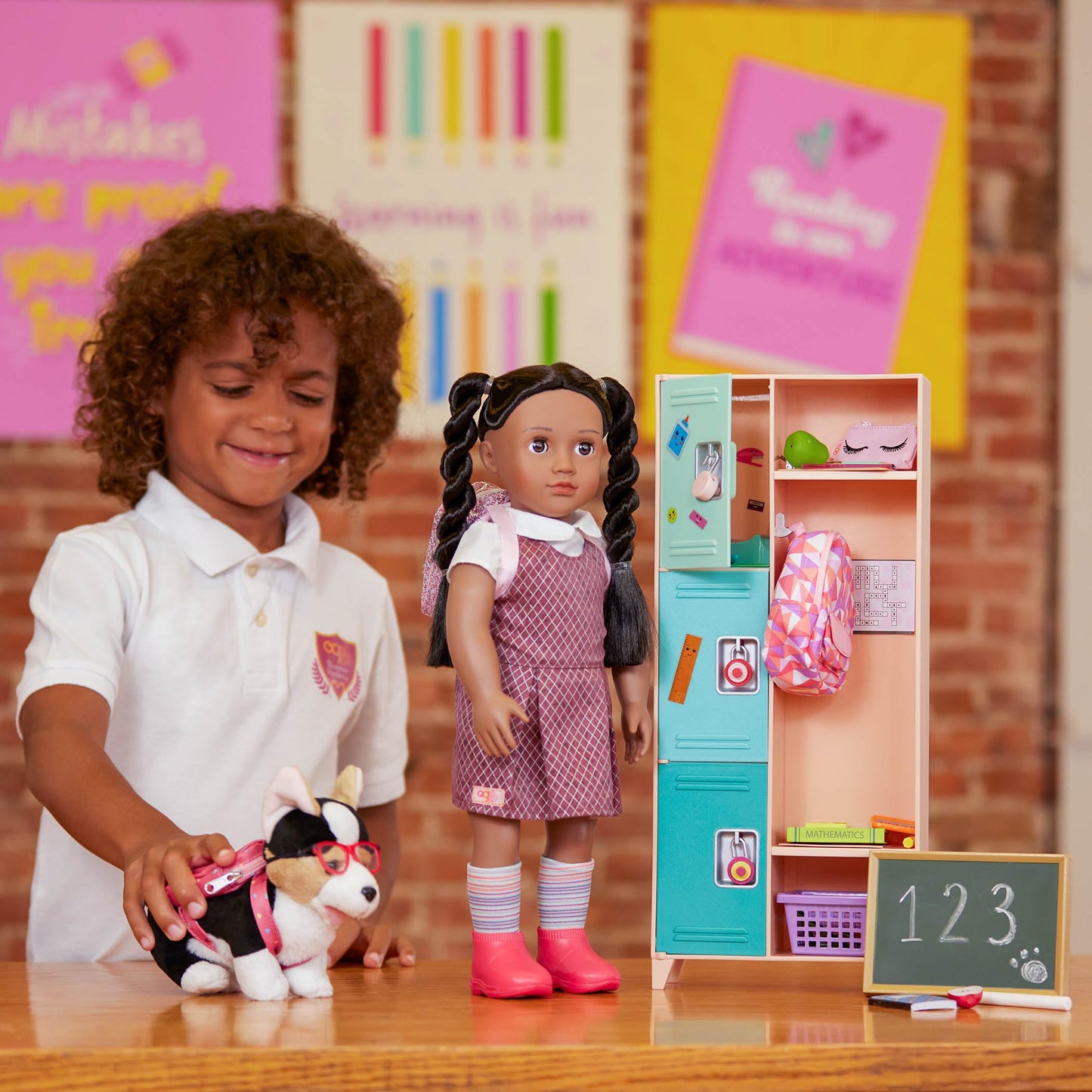 Our Generation Off To School doll accessories set with backpack, books, notebook, and more for children's imaginative play.