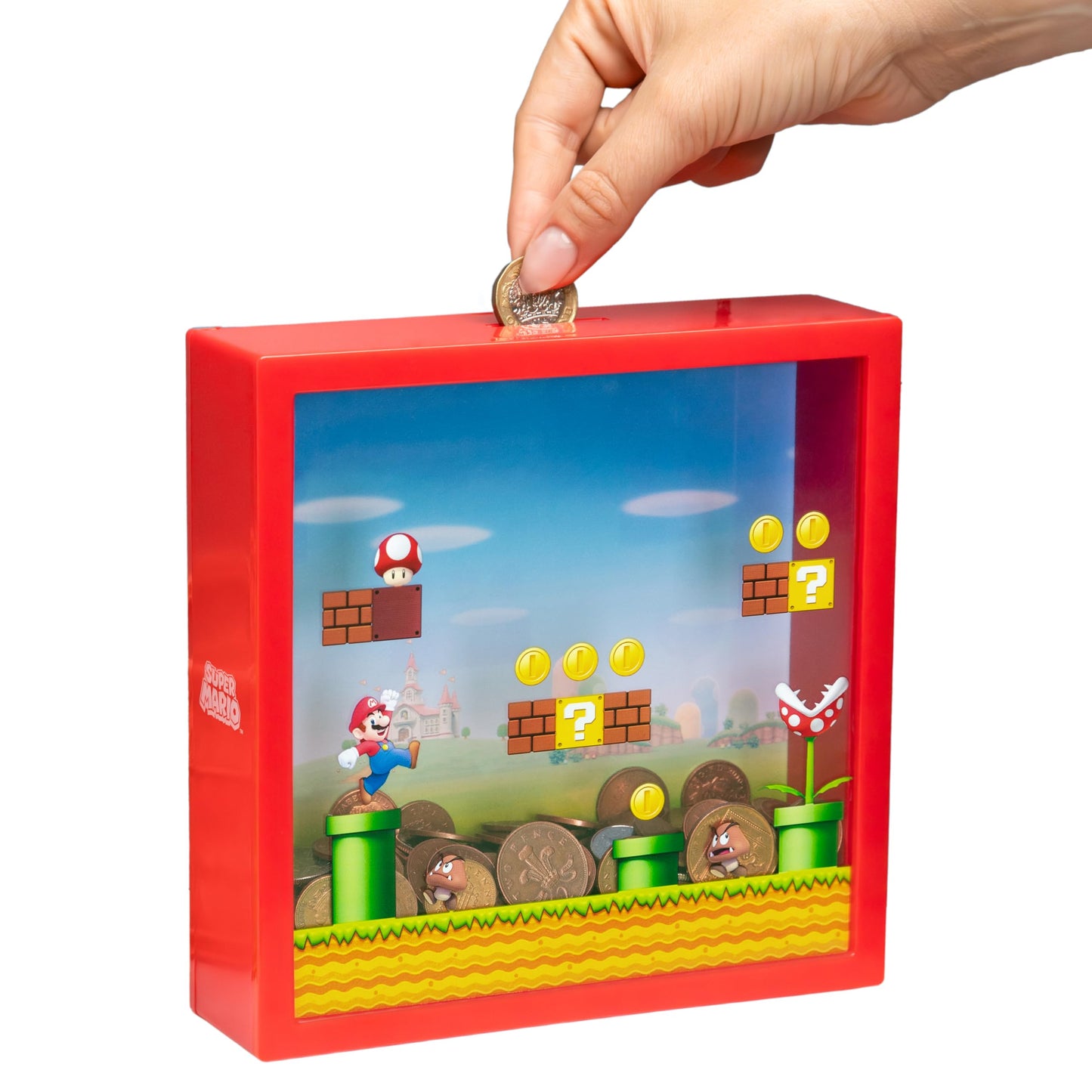 Super Mario money box by Paladone, a Nintendo piggy bank featuring Mario for savings and gift for Mario Bros fans, 18cm tall.