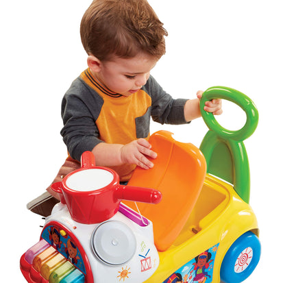 Little People Ultimate Toddler Ride-On Toy with Music & Lights by Jakks Pacific – 5 Marching Tunes, Instrument Play Mode, Detachable Trumpet, Engine Sounds, Under-Seat Storage, Batteries Included