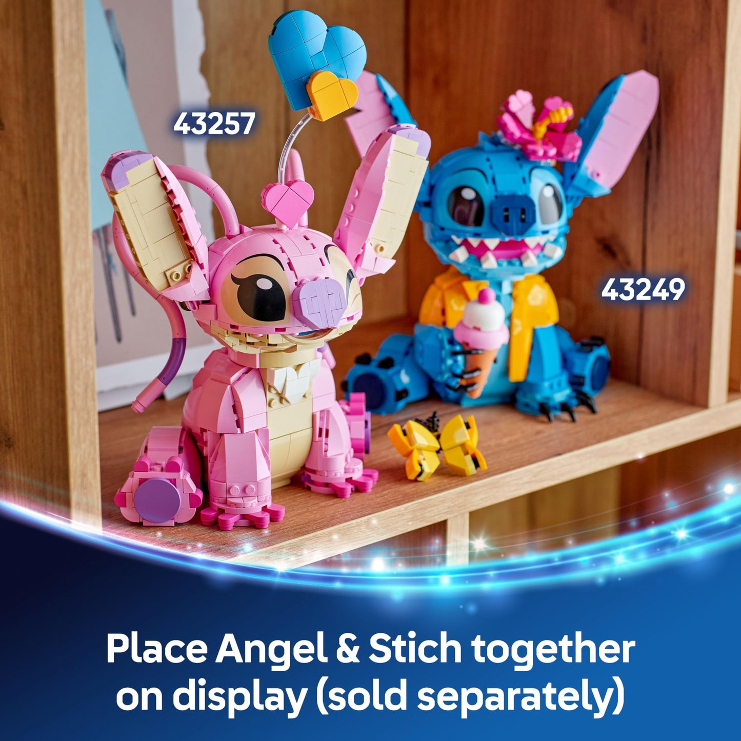 LEGO Disney Angel figure from Lilo & Stitch holding three heart balloons and a butterfly in a colorful display.