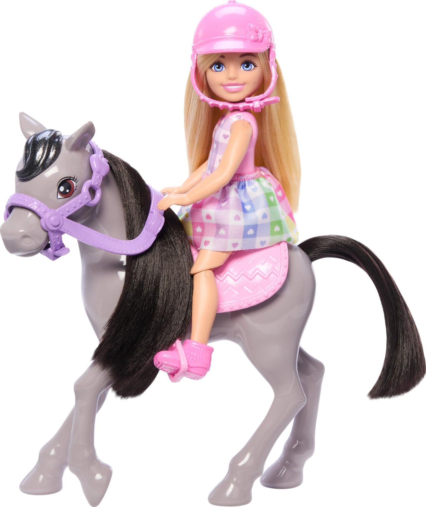 Barbie Chelsea doll riding a gray toy pony with helmet and saddle accessories, doll bending at knees for riding play.