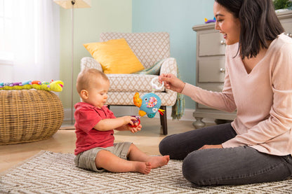 LAMAZE Mini Eloy the Elephant baby toy with clip, sensory toy for newborns, suitable for prams and pushchairs.