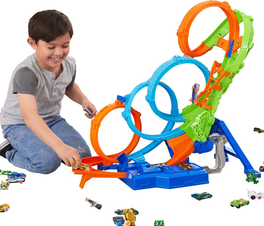 Hot Wheels track set featuring 4 loops, 3-way crash zone, motorized booster, and a 1:64 scale toy car.