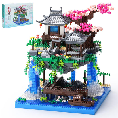 CAXIMSY Cherry Blossom Bonsai Treehouse building block set with 3300 pieces, featuring intricate tree and house design.