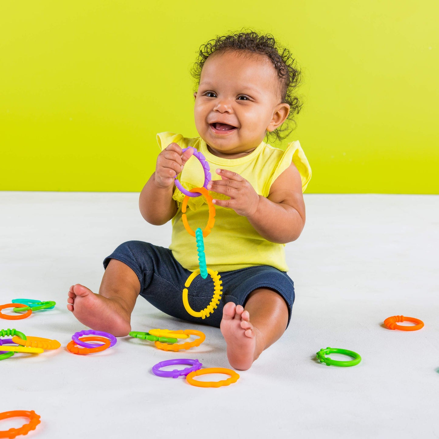 Bright Starts Lots of Links Rings Toy in colorful plastic, BPA-free 24-piece set for infants ages 0 months and up.