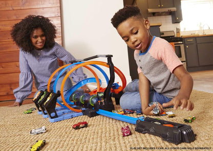 Hot Wheels Track Set and Toy Car, Large-Scale Motorized Track with 3 Corkscrew Loops, 3 Crash Zones and Toy Storage, FTB65