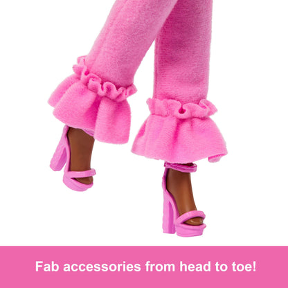 Barbie Deluxe Style Doll #4 in pink and brown braids, wearing a soft pink top and pant set with furry collar and accessories.
