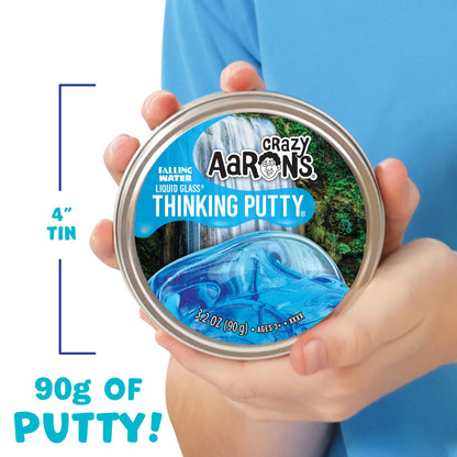 Crazy Aaron's Liquid Glass Thinking Putty in Falling Water crystal clear blue, showing its smooth, moldable texture and vibrant color.
