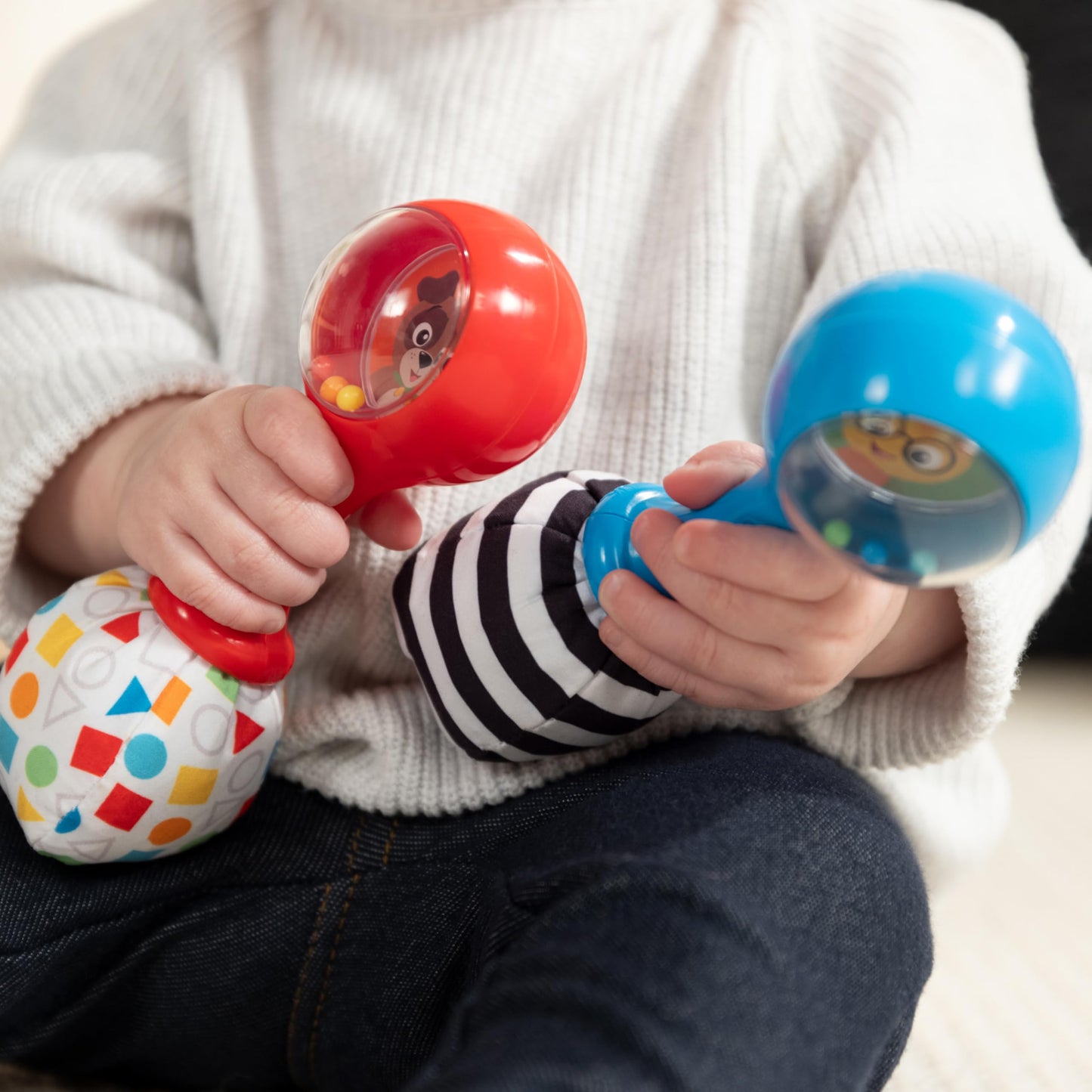 Baby Einstein Shake & Groove Toy maracas for babies 3+ months, colorful infant musical instrument toy with rattling sounds.