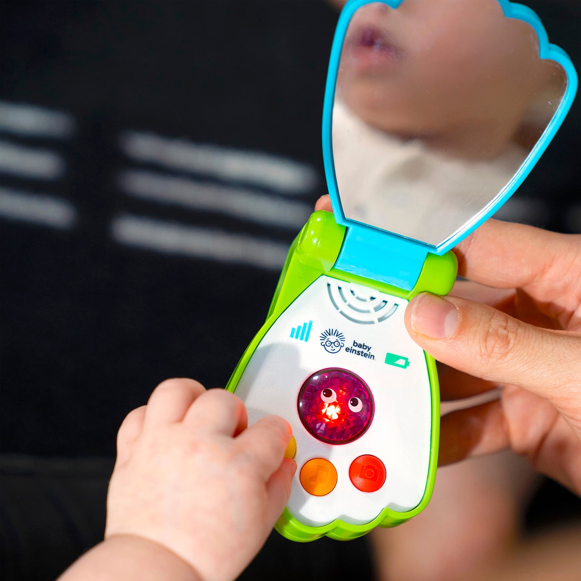 Baby Einstein Ocean Explorers Shell Phone musical toy for babies age 6 months and up, featuring colorful ocean-themed design and buttons
