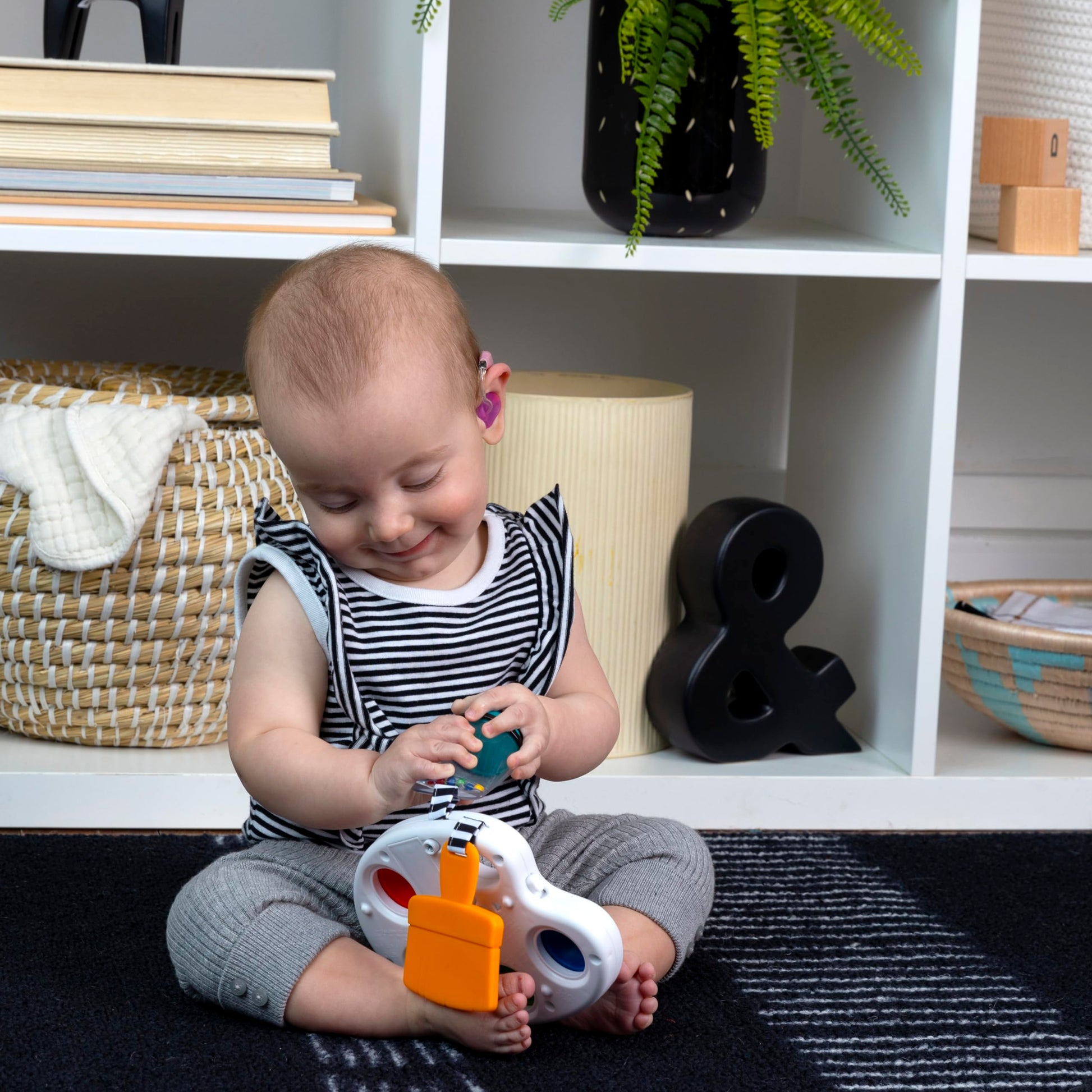 Baby Einstein Color Palette Popper sensory fidget toy showing colorful popper buttons for infants aged 6 months and up.