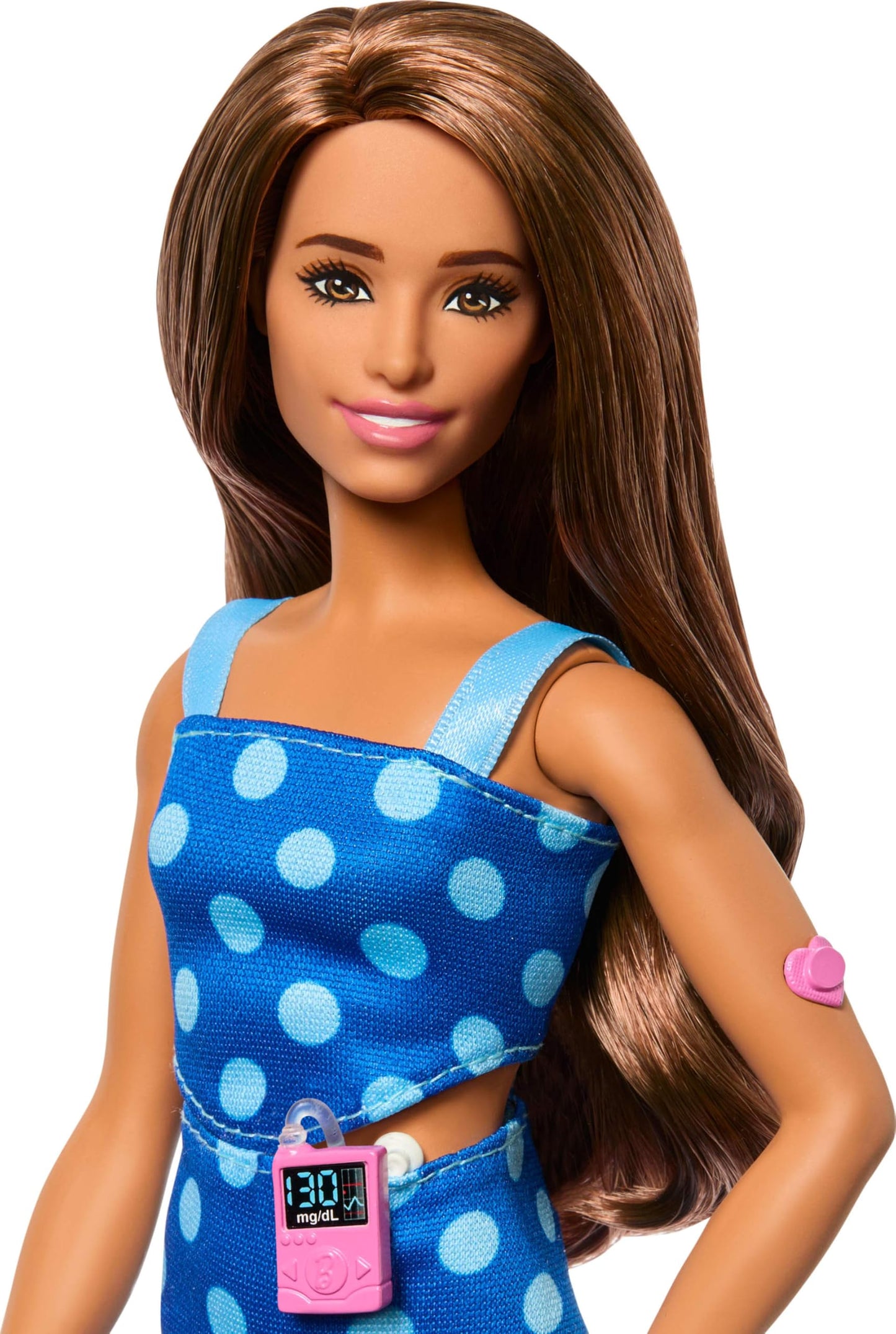 Barbie Fashionistas Doll #242 with Type 1 Diabetes in a polka dot outfit and accessories, showcasing diversity and inclusion.