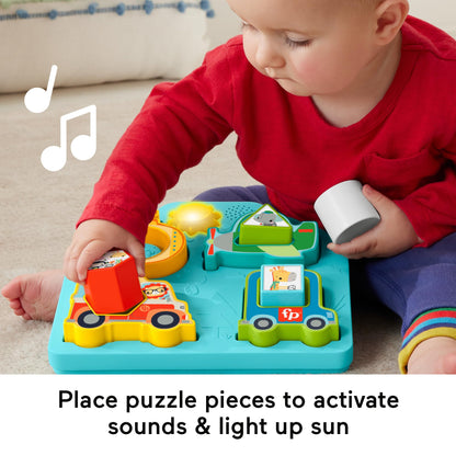 Fisher-Price baby sorting toy with colorful shapes, vehicle design, music, lights, and sound features for fine motor skill play.