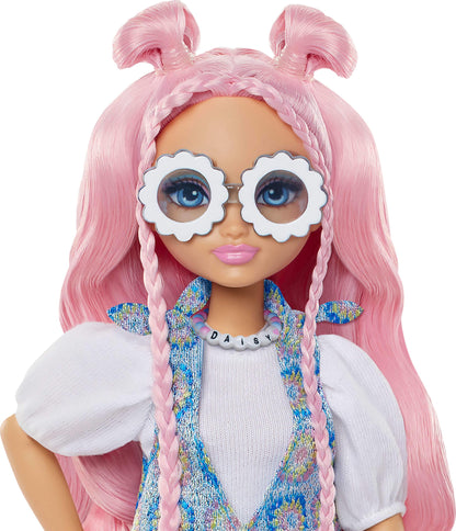 Barbie Dream Besties Daisy Jean fashion doll with wavy pink hair, removable outfits, and DJ-themed accessories.