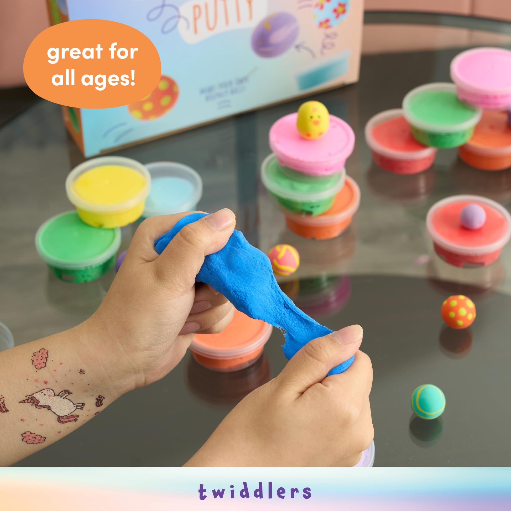 Colorful bouncing slime putty tubs from THE TWIDDLERS, fun fidget toys and party bag fillers for kids, with vibrant, bouncy slime.