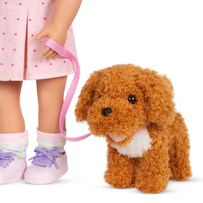 Our Generation poodle dog plush in a pet carrier bag, perfect for 18-inch doll accessories and kids 3+ years.