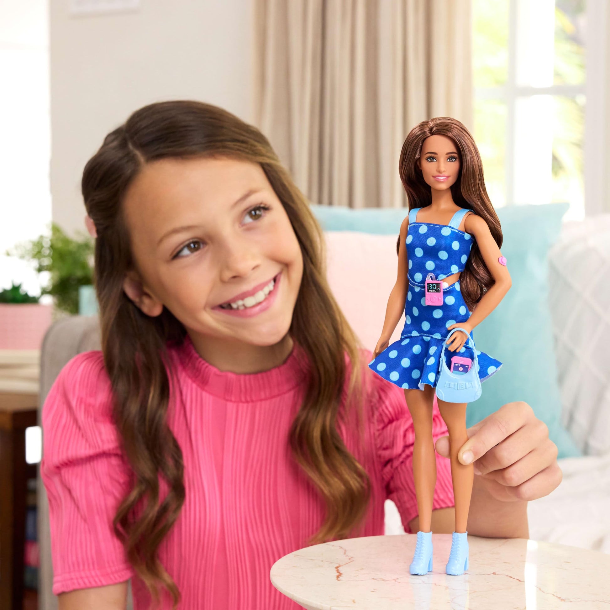 Barbie Fashionistas Doll #242 in a polka dot outfit, showcasing Type 1 Diabetes accessories and a stylish look.