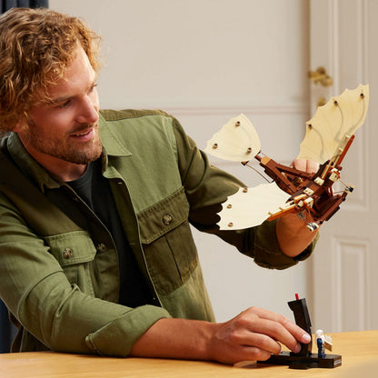 LEGO Icons Leonardo da Vinci’s Flying Machine model kit displayed on a desk, showcasing intricate design details for adults.
